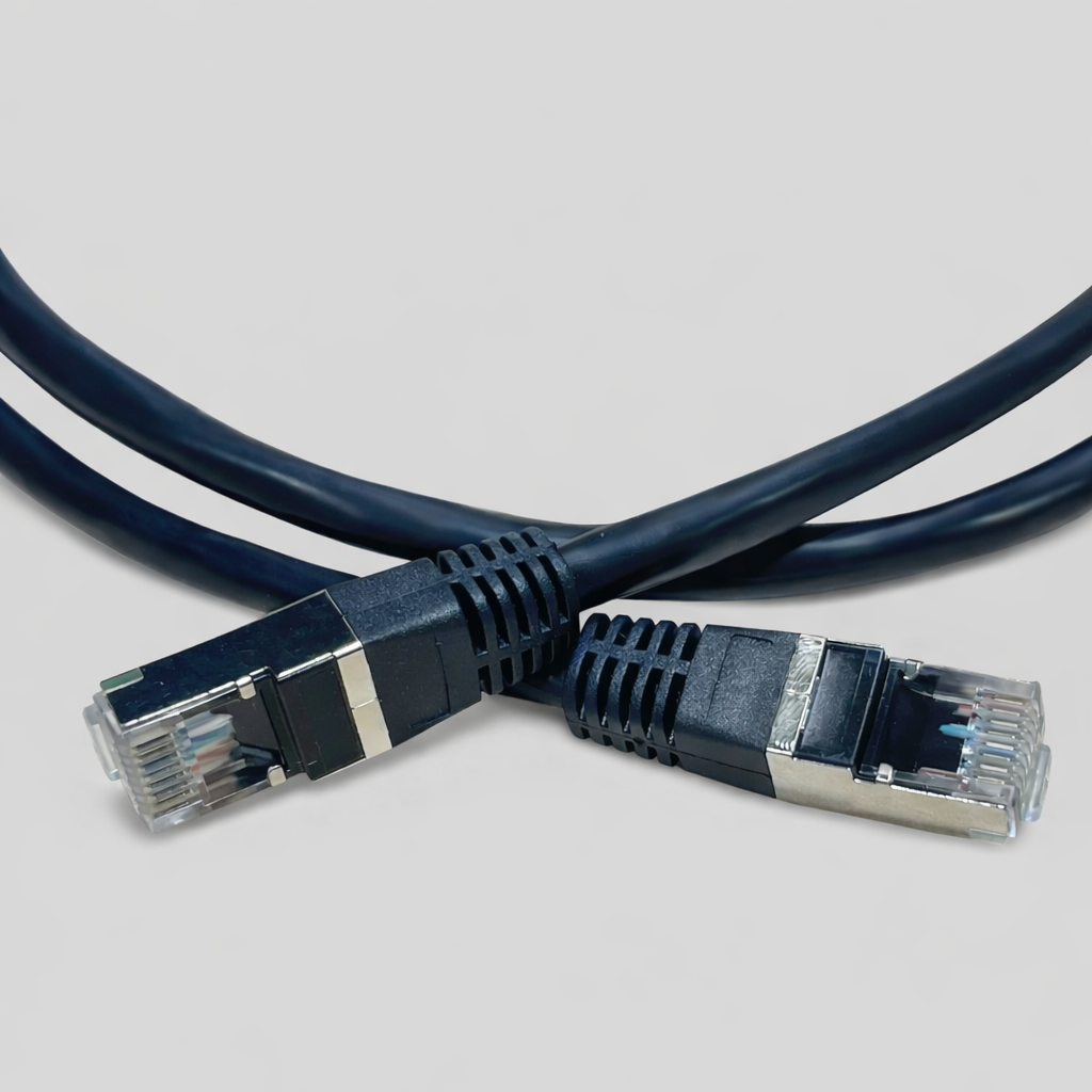 CAT5e shielded Ethernet cable with RJ45 connectors crossed, showing metal shielding for Starlink patch cable requirements