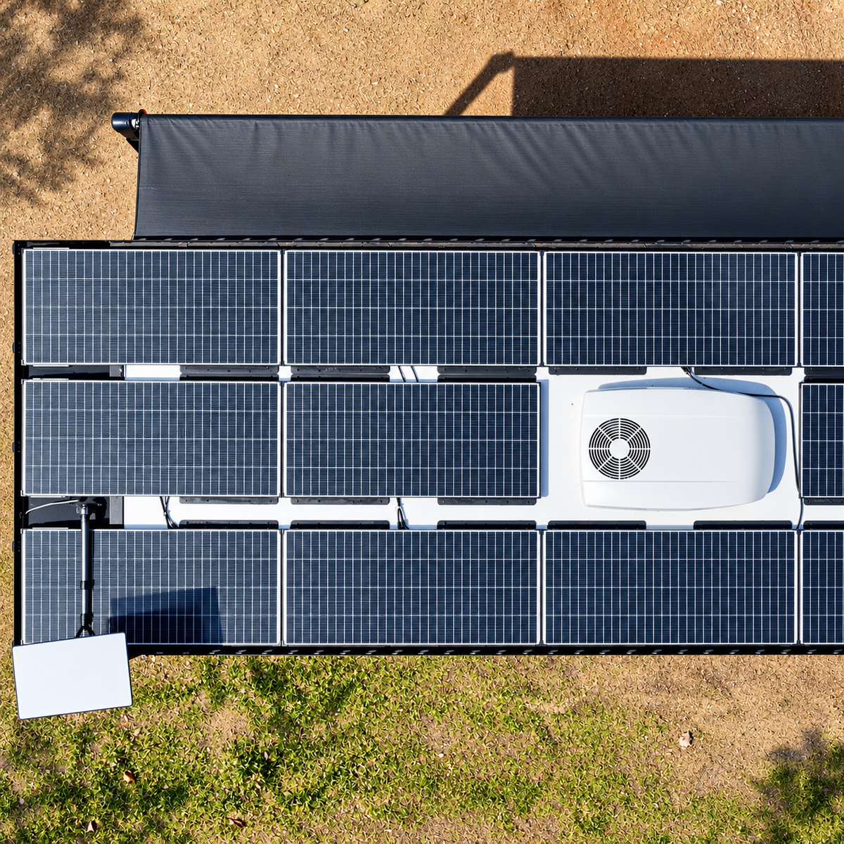 Spacetek Starlink telescopic mount supporting a Starlink dish beside a caravan roof fully covered in solar panels, providing a neat, space-saving installation.