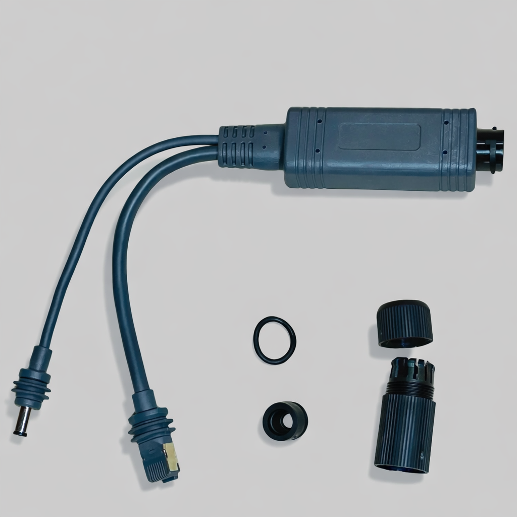 Disassembled Starlink Mini combiner splitter adapter with DC and RJ45 plugs, waterproof seals and housing – premium-grade installation hardware