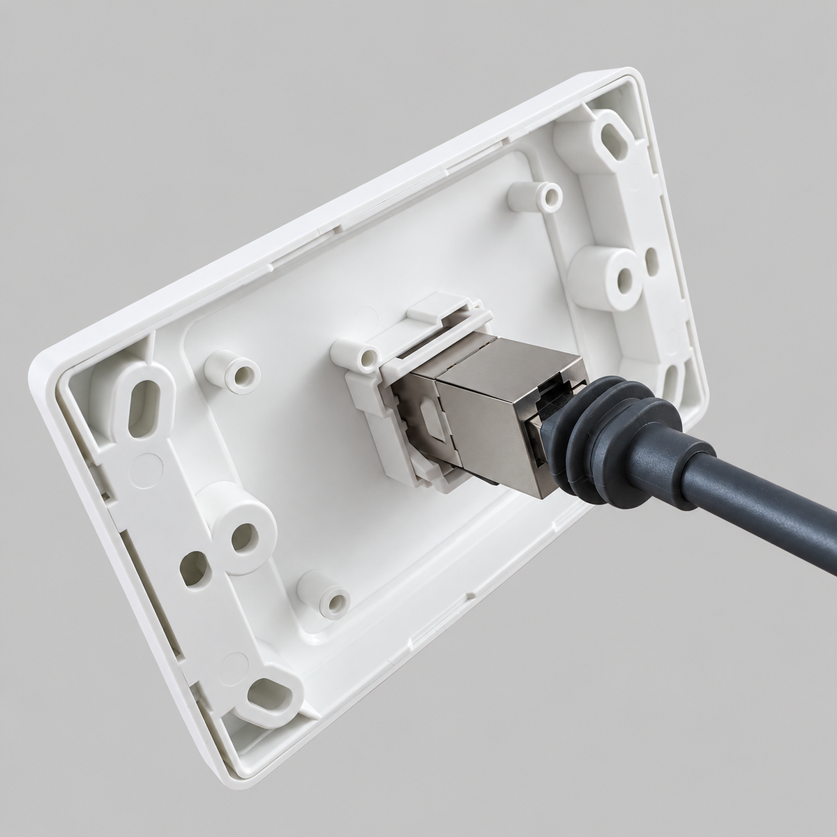 Rear view of Spacetek indoor wall plate for Starlink showing the female-to-female Ethernet mech and connected Starlink cable
