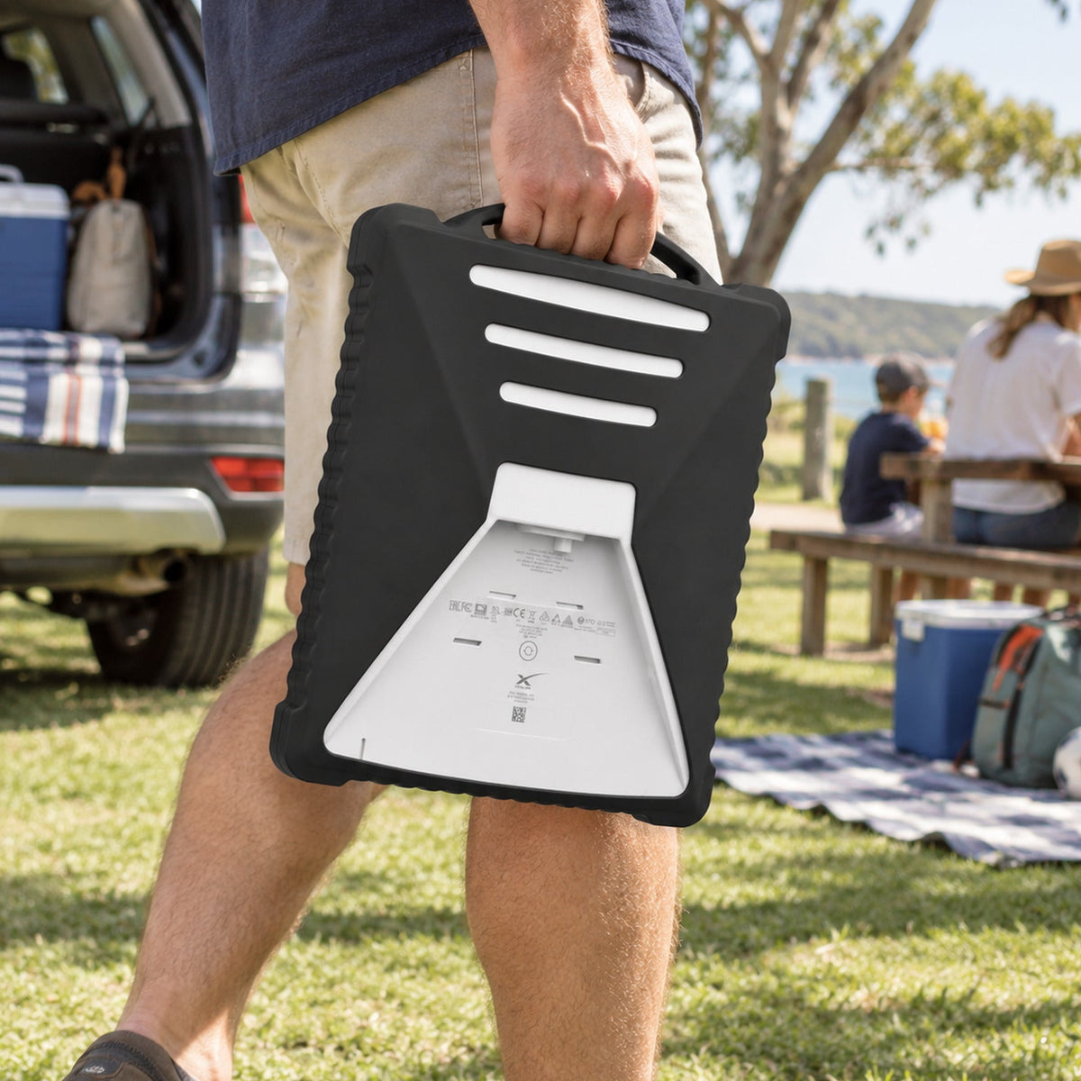 Black Starlink Mini silicone protective cover with integrated carry handle for impact protection on the go.